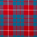 A person holding a piece of Lightweight Tartan by the meter G-L, illustrating its versatility for various crafting projects.