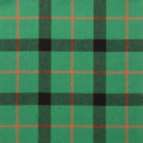 Roll of Lightweight Tartan by the meter G-L displayed on a table, demonstrating its practical use for fashion designers and crafters.