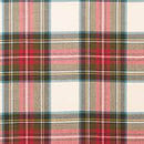 Beautiful display of the Luxury Tartan Handfasting Ribbon with Embroidery beside a matching ring cushion for complete wedding decor.