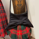 Kilgour Modern Effie Bag featuring a vibrant color contrast and elegant bow design, made of high-quality 100% Wool Melton.