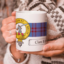 Elliot Clan Crest and Tartan Mug showcasing Clan pride, perfect for daily use or as a collector's item.