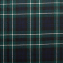 Stylish Springweight Wool Tartan Ties displayed on a wooden table, illustrating their versatility for both casual and formal wear.