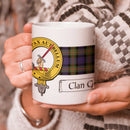 Gunn Clan Crest and Tartan Mug, showing a detailed design of the clan crest on an 11 oz ceramic mug, perfect for expressing clan pride.