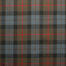 Stylish model wearing a Springweight Wool Tartan Tie, perfect for any occasion.