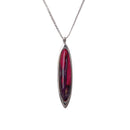 Heathergems Long Oval Pendant showcasing the unique Scottish craftsmanship with vibrant colors, made from heather and resin, perfect for personal gifting.