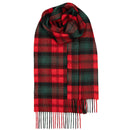 A stylish individual wearing a Bowhill Standard Tartan Lambswool Scarf, demonstrating its versatility for both casual and formal outfits.