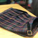 A happy child wearing the Wee Kiltie, representing the spirit and tradition of Scottish heritage in a stylish outfit.