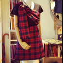 Close-up of the Mini Kilt - Reiver's fabric texture, highlighting its Scottish craftsmanship and included matching sash.