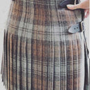 Ladies Hand Stitched Tweed Kilt worn by a model, demonstrating its perfect fit and tailored design.