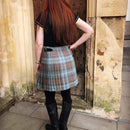 Back view of the Ladies Hand Stitched Tweed Kilt, emphasizing the pleats and structured canvas lining.