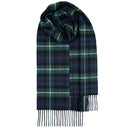Model wearing Bowhill Standard Tartan Lambswool Scarf, demonstrating its versatility as a fashionable winter accessory.
