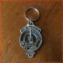 Clan MacAlister Metal Keyring featuring the clan crest on one side and the clan motto on the other, measuring 1.5 inches by 1 inch.