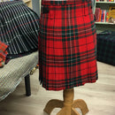 MacAuley Red Modern Heavyweight Hand Stitched Kilt on display, showcasing its traditional craftsmanship and vibrant tartan fabric.