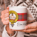 MacFarlane Clan Crest and Tartan Mug showcasing clan pride, perfect for hot beverages, 11 oz capacity.