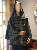 Close-up of the MacLaren Ancient Laird Cape showcasing the quality craftsmanship and vibrant colors of the tartan fabric.