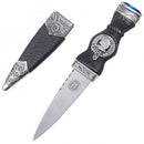 Clan Crest Sgain Dubh - Coloured Stone showcasing the multi-faceted stone and detailed metalwork against a stylish backdrop.