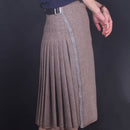 Ladies Hand Stitched Tweed Kilt displayed elegantly showcasing the rich texture of 100% wool tweed.